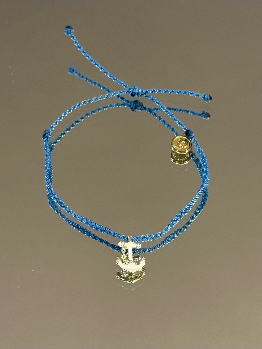 Pura Vida. Blue Cord Bracelet with Gold Anchor Charm